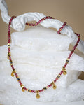 Short Garnet neckalce with gold shell elements